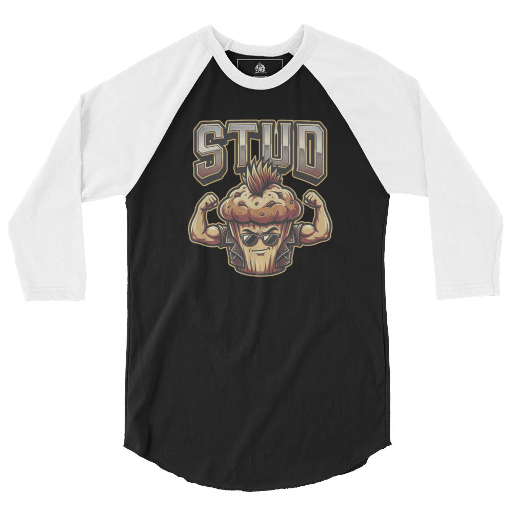 Stud Muffin funny graphic tee — muscular muffin character with mohawk, aviator sunglasses and flexing biceps under large STUD varsity text on white tee