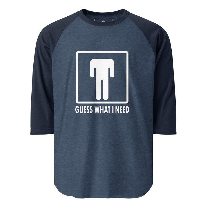 Guess What I Need — a restroom-style figure icon with the head dropped down to the waist, captioned Guess What I Need, printed on a 3/4 sleeve raglan shirt.