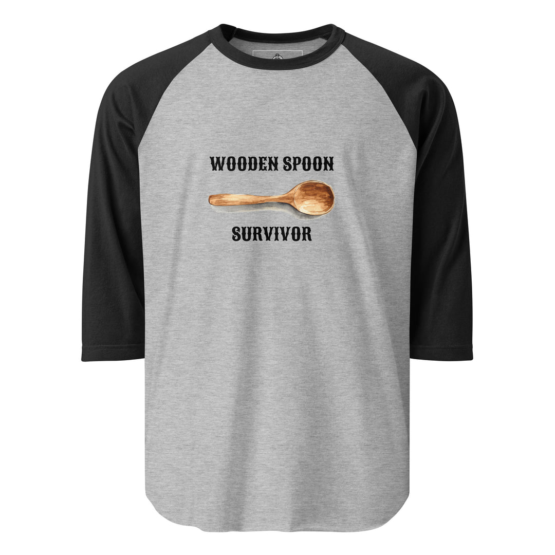 Wooden Spoon Survivor — a lone wooden spoon, captioned Wooden Spoon Survivor, printed on a 3/4 sleeve raglan shirt.