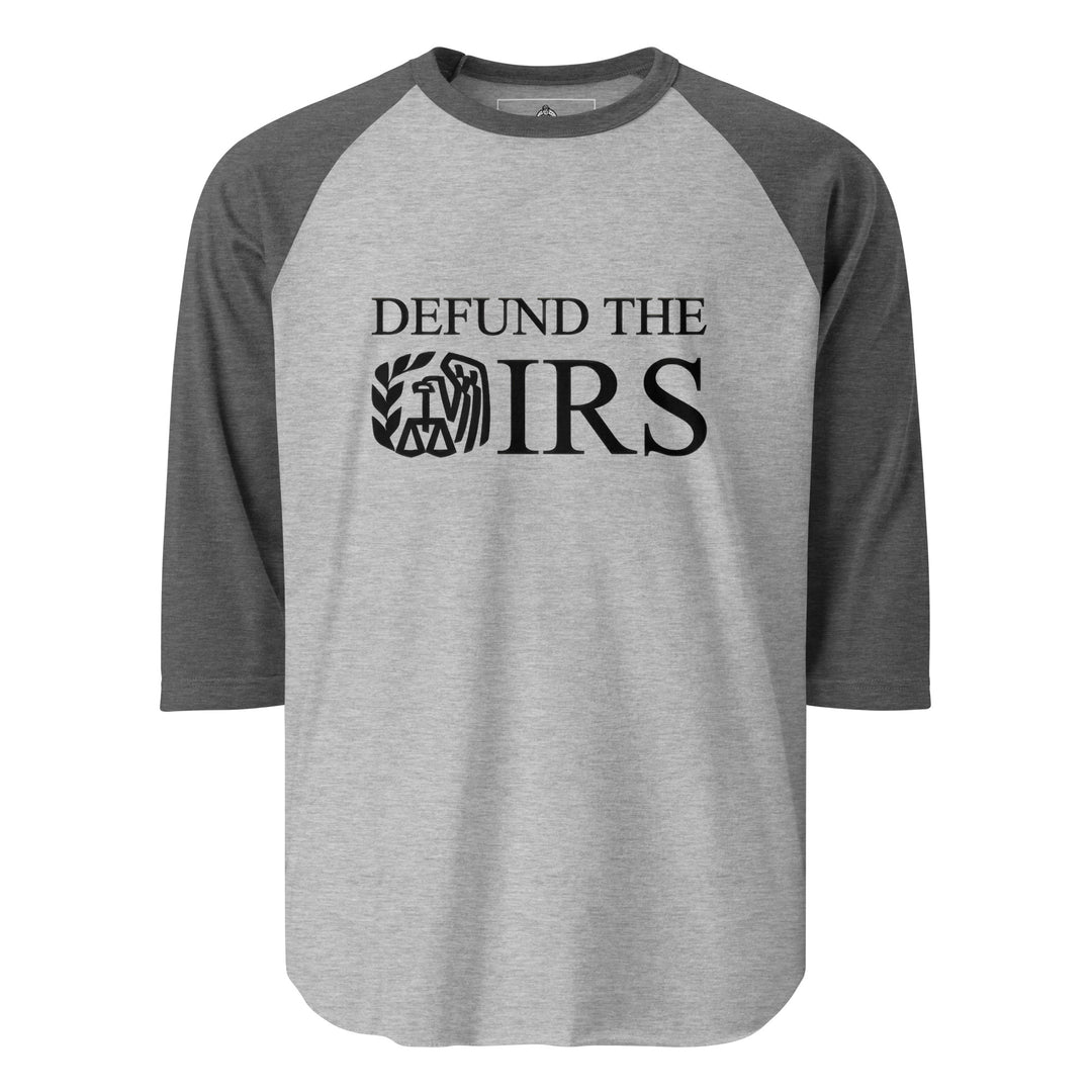 Defund The IRS — a bold Defund The IRS statement design, printed on a 3/4 sleeve raglan shirt.