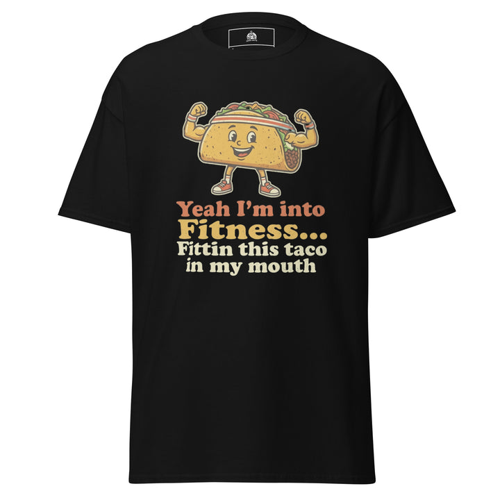 Yeah I'm Into Fitness Fittin This Taco In My Mouth funny graphic tee — flexing cartoon taco wearing a sweatband and sneakers