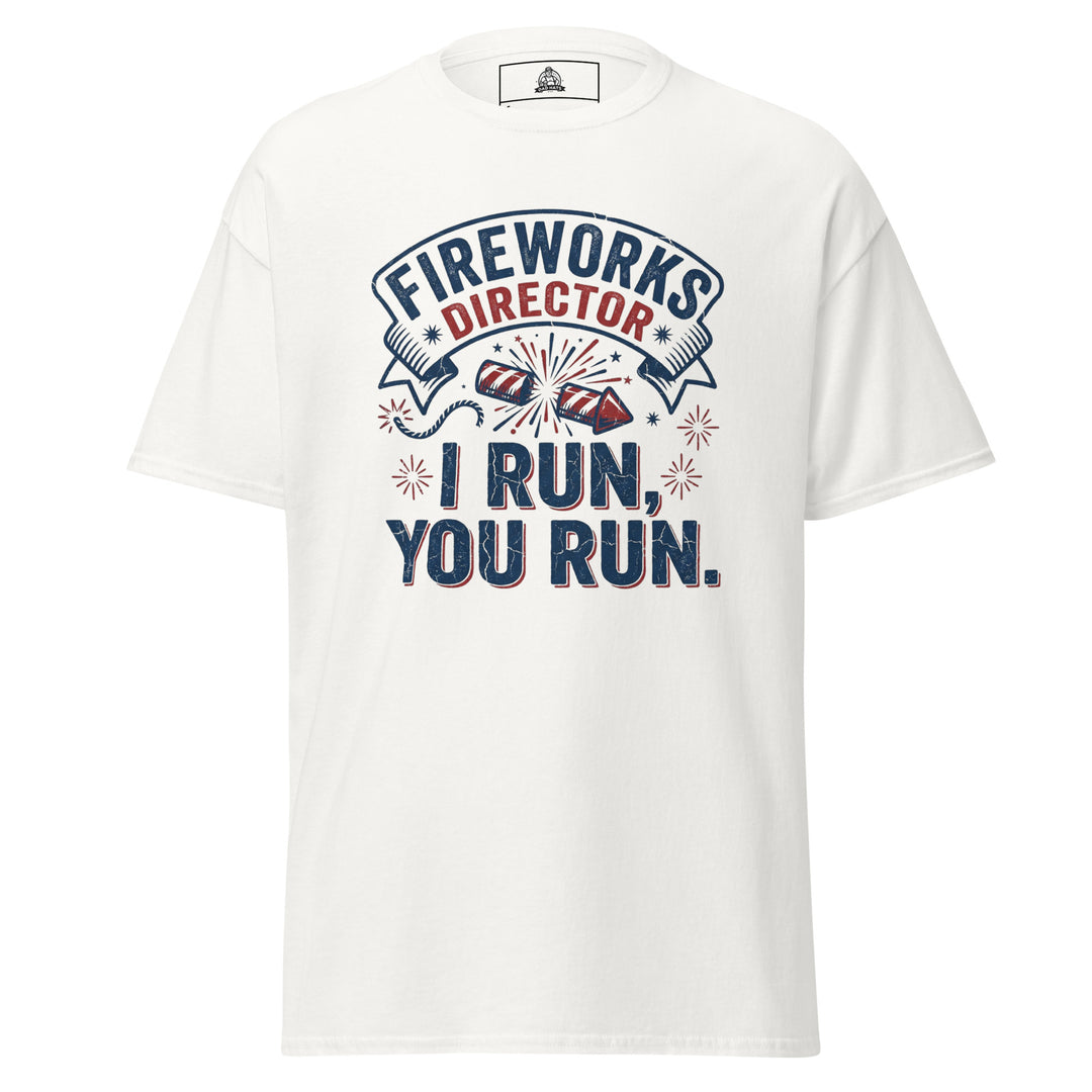 Fireworks Director funny 4th of July graphic tee — vintage banner with firework rockets and FIREWORKS DIRECTOR I RUN YOU RUN text in red white and blue on white tee