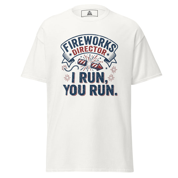 Fireworks Director funny 4th of July graphic tee — vintage banner with firework rockets and FIREWORKS DIRECTOR I RUN YOU RUN text in red white and blue on white tee