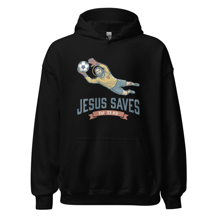Jesus Saves — Jesus as a soccer goalkeeper diving to catch the ball with a halo, captioned Jesus Saves Est 33 AD, printed on a unisex hoodie.