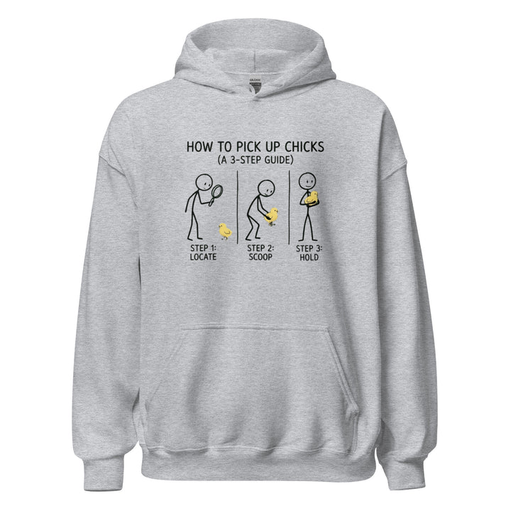 How To Pick Up Chicks — a stick-figure 3-step guide to picking up baby chicks: locate, scoop, hold, printed on a unisex hoodie.