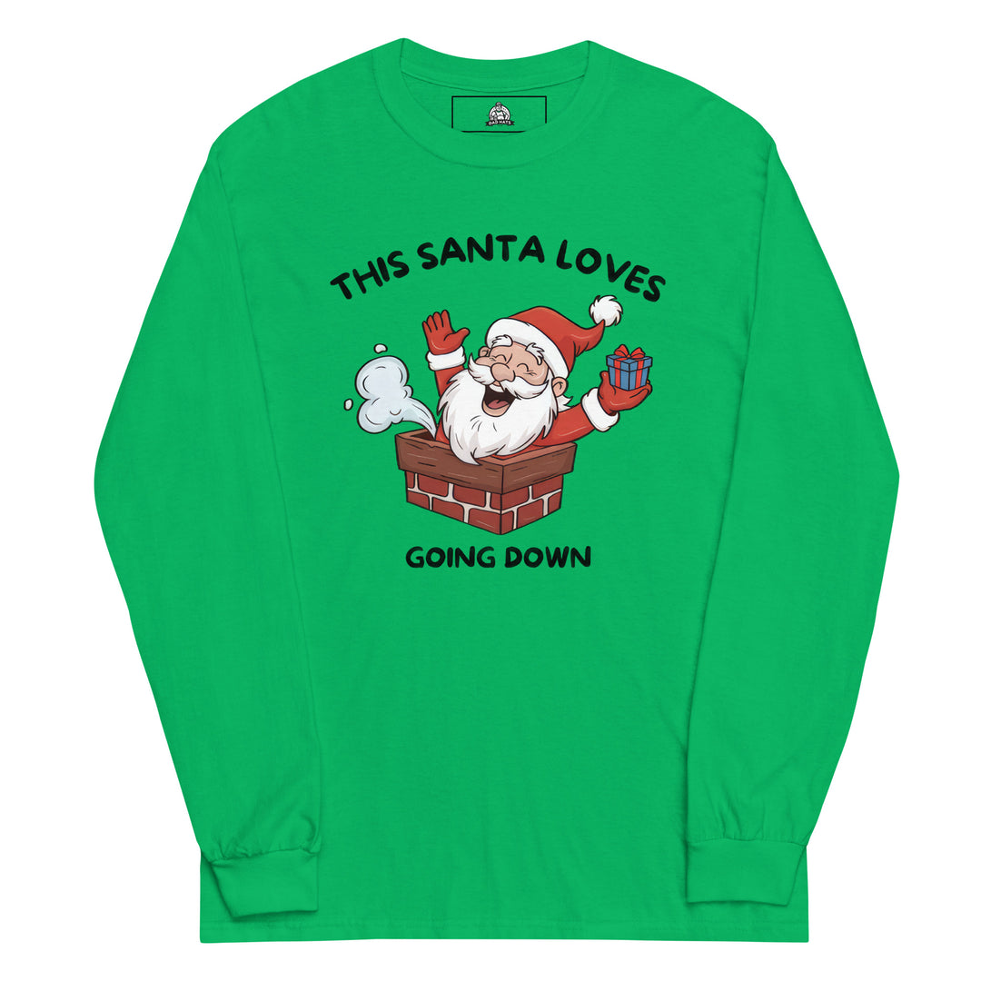 This Santa Loves Going Down — a cheerful Santa popping out of a chimney holding a gift, captioned This Santa Loves Going Down, printed on a long sleeve shirt.