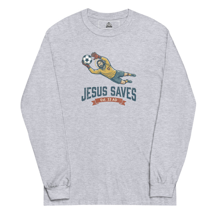 Jesus Saves — Jesus as a soccer goalkeeper diving to catch the ball with a halo, captioned Jesus Saves Est 33 AD, printed on a long sleeve shirt.