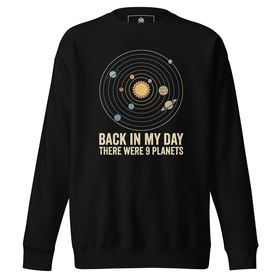 Back In My Day There Were 9 Planets funny graphic tee — vintage solar system diagram with sun, orbit rings, and all nine planets including Pluto