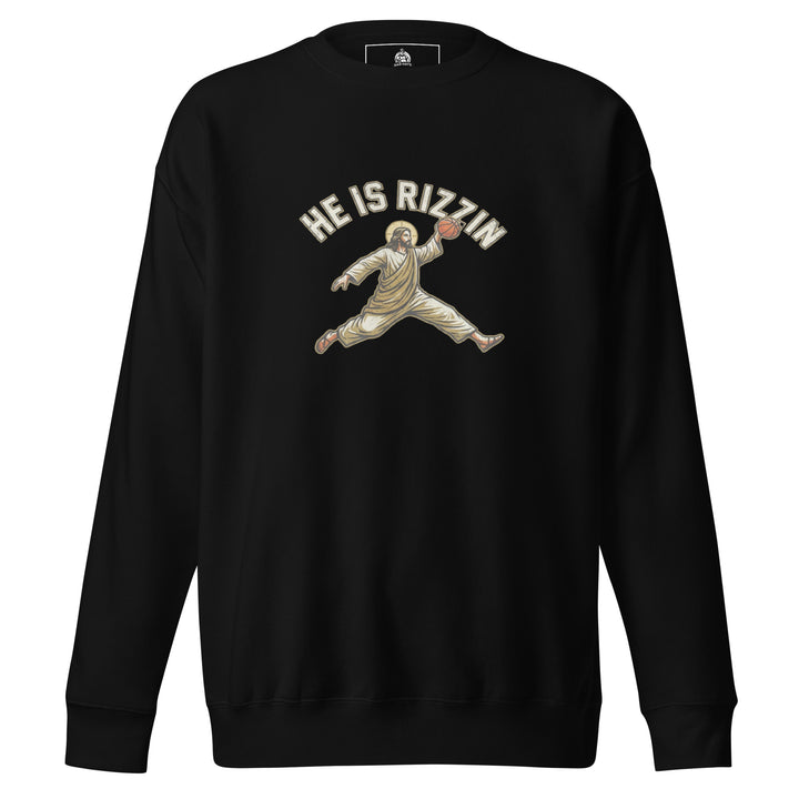 He Is Rizzin — Jesus doing a Jordan-style basketball dunk with a halo, captioned He Is Rizzin, printed on a unisex sweatshirt.