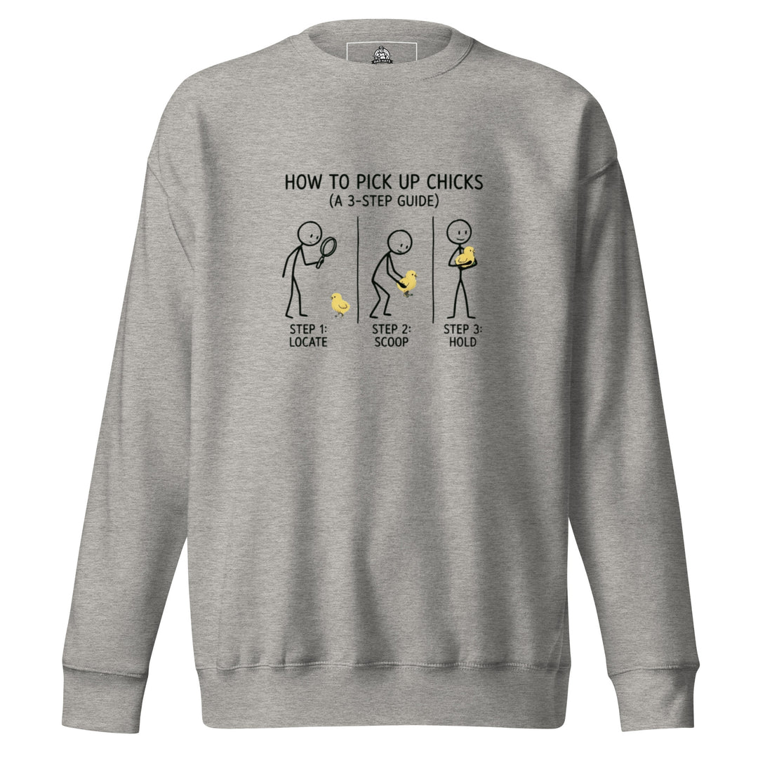 How To Pick Up Chicks — a stick-figure 3-step guide to picking up baby chicks: locate, scoop, hold, printed on a unisex sweatshirt.