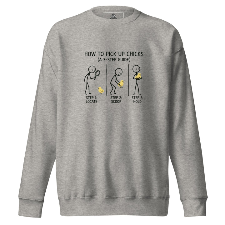 How To Pick Up Chicks — a stick-figure 3-step guide to picking up baby chicks: locate, scoop, hold, printed on a unisex sweatshirt.