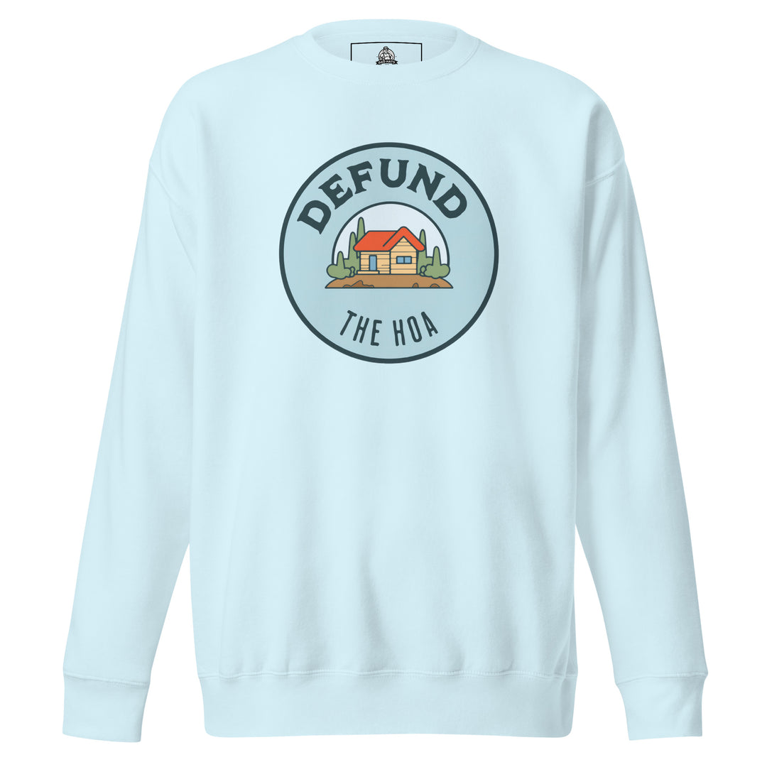 Defund The HOA funny suburban graphic tee — circular badge with cartoon house and trees and DEFUND THE HOA text