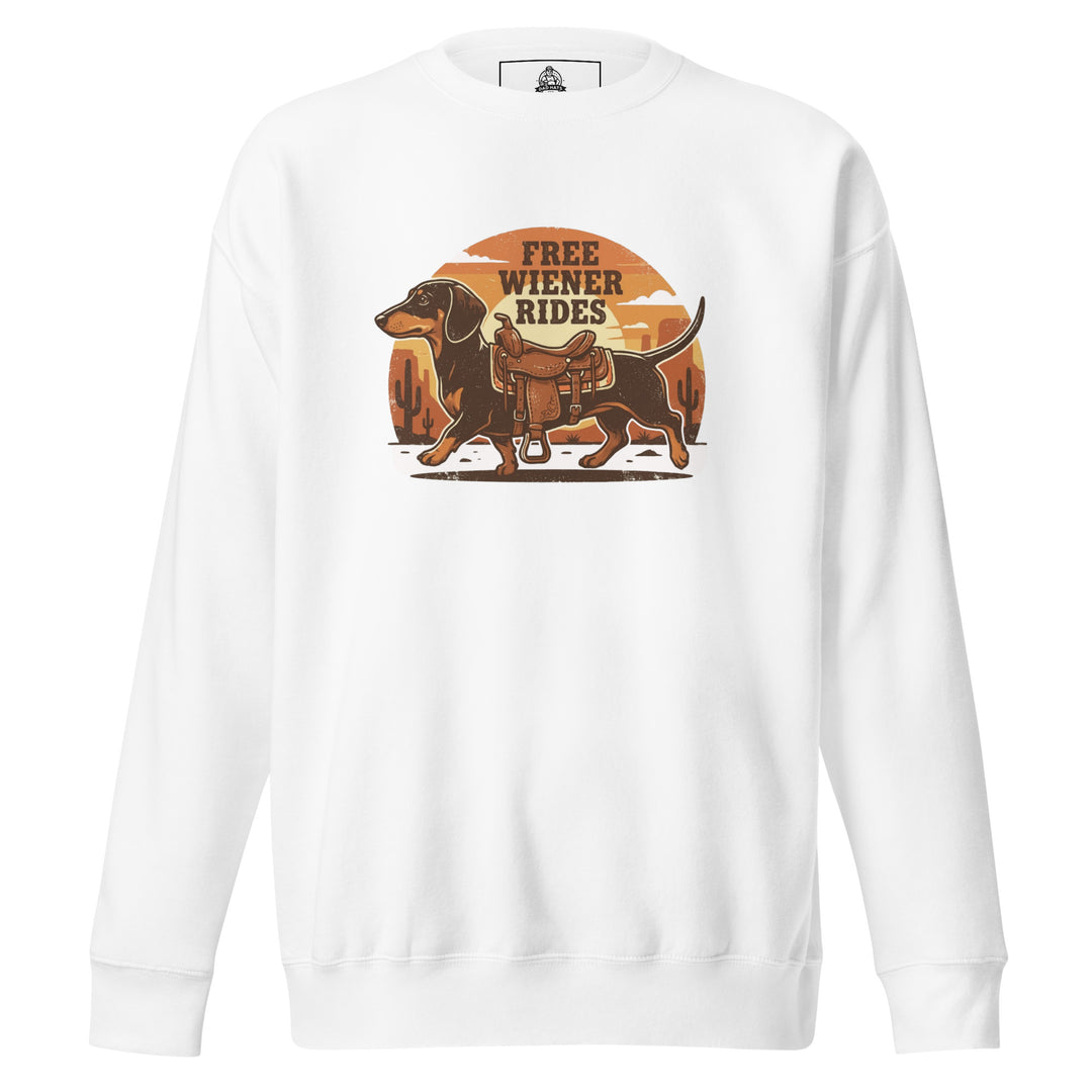 Free Wiener Rides — a dachshund wearing a western saddle in a desert sunset, captioned Free Wiener Rides, printed on a unisex sweatshirt.
