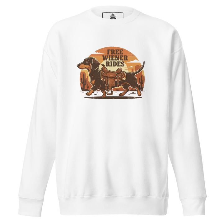 Free Wiener Rides — a dachshund wearing a western saddle in a desert sunset, captioned Free Wiener Rides, printed on a unisex sweatshirt.